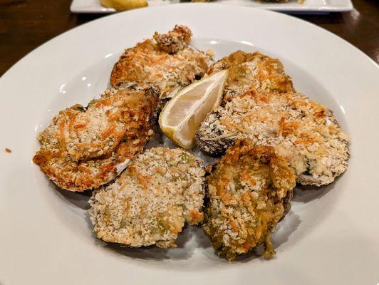 Very cold broiled (?) oysters, with mainly bread crumbs and cheese.