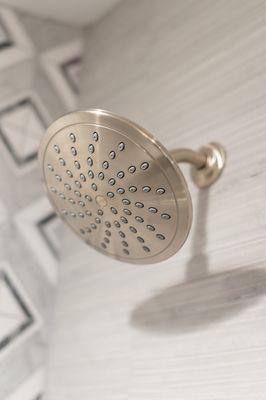 Up close detail of a shower fixture in the bathroom.