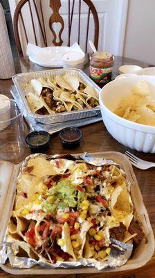 Short rib nachos & veggie tacos & pork tacos & chips