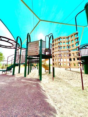 Sand and rubberized play surfaces