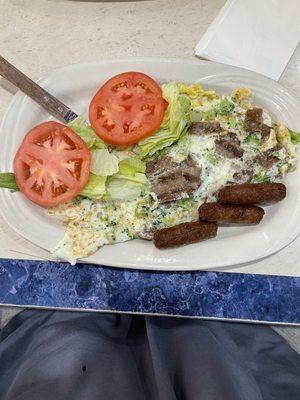 Broccoli and gyro egg white omelette with turkey sausage.