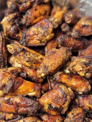 There is nothing like our awesome Jerk Wings, marinated in our house jerk seasoning and jerked on the grill daily.