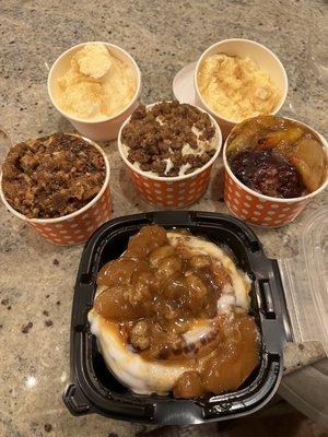 Stuffed Cinnamon Roll front  Peach Praline Cobbler left side  Bourbon Pecan Banana Pudding middle Blackberry Peach Cobbler right side