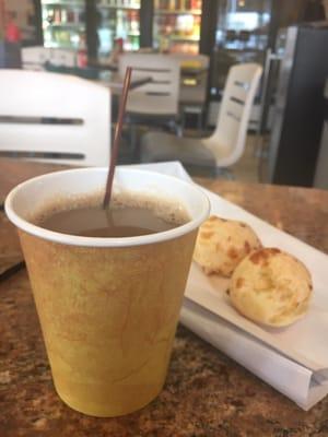 Coffee and pão de queijo. Under $3.