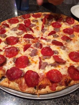 14" pepperoni and sausage pizza.