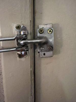 Another missing screw on door lock.