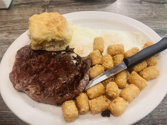 8oz ribeye, 2 eggs, Tator tots, biscuit