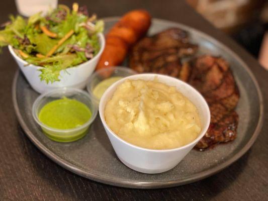 Picanha Steak Plate with side salad and mash potatoes.