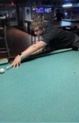 A man is half a man without his pool cue