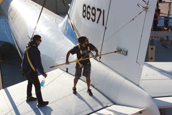 Anthony and Chris waxing the tail of "Air Force One/ FREEDOM ONE"