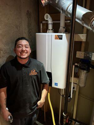 Damian with a new tankless water heater!