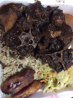 oxtails, rice & peas, cabbage, and plantains