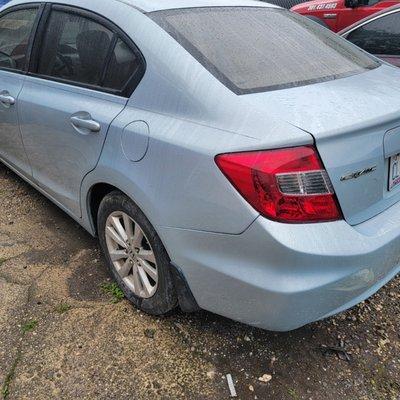 After Pic; Honda Civic repaired from quarter panel damage and rear lamp replacement.