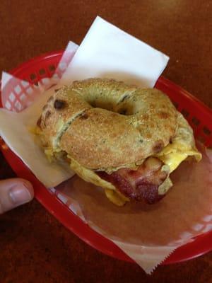 Bacon egg and pepper jack cheese on spinach bagel.