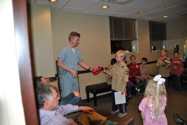 Dr. Kaneaster gave each scout a First Aid Kit.