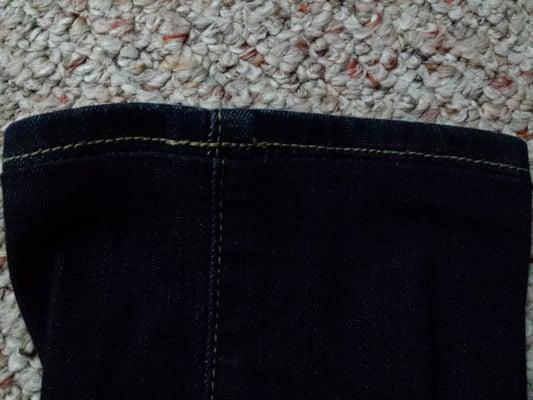 Example of their original hem line. Vertical seam isn't lined up and aparent gap between new and original hem.