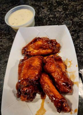 75© wings w/stinging honey garlic sauce.