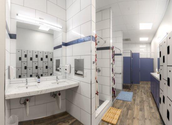 Showers available in men's and women's room, toiletries, shampoo, and body wash provided