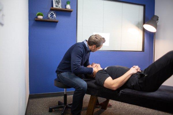 Dr. Ehlers in one of our treatment rooms, adjusting a patient