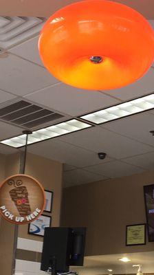 Fun donut shaped light in front of the register