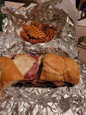 Barn burger with sausage and seasoned fries