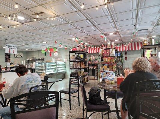 large open dining with beautiful Italian themes. It reminds me growing up as a kid of the family owned stores in our Italian neighborhood.