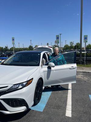 My mom and her new Toyota Camry