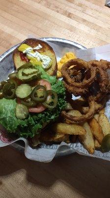 1/2 lb Bacon Cheddar burger with half onion rings /half fries