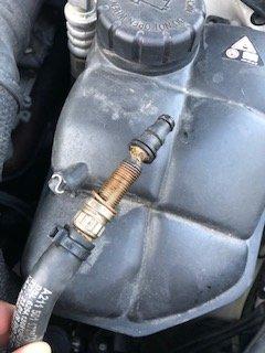 Coolant hose has something shoved in it