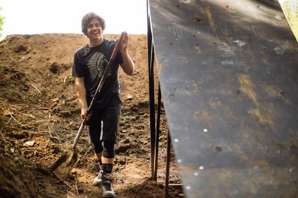 Carson Storch, building our mulch jump.