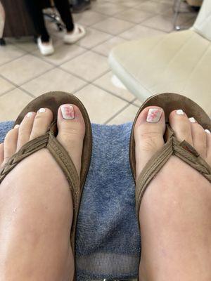 Gel pedicure with floral design