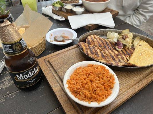 Grilled chicken and quesadilla with a side of rice. Friend got the vehicles tortilla soup, both were good