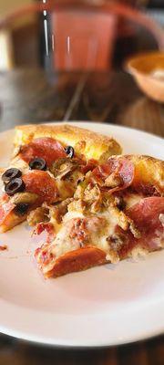 Slices of pizza from lunch buffet