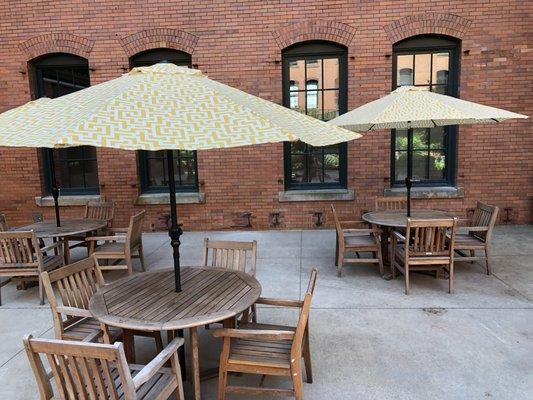 Outdoor seating for meals or just relaxing. More tables and chairs are located near the river walk.