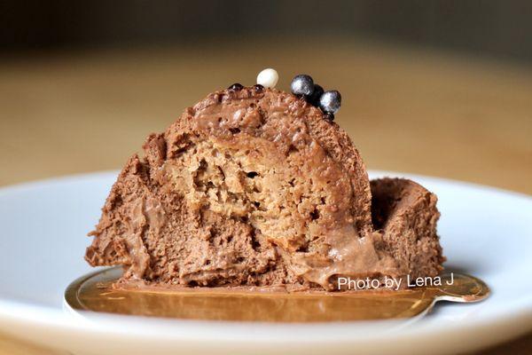 Inside of Dark chocolate mousse small cake ($6.50) - chocolate mousse with crunchy hazelnut filling. Delicious!