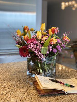 It may be snowing outside, but the fresh tulips and Gerbera daisies tell a different story inside. Thanks Amy!  You're the best!!!