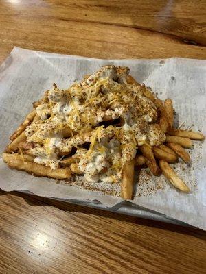 Crab dip over Old Bay beer battered fries