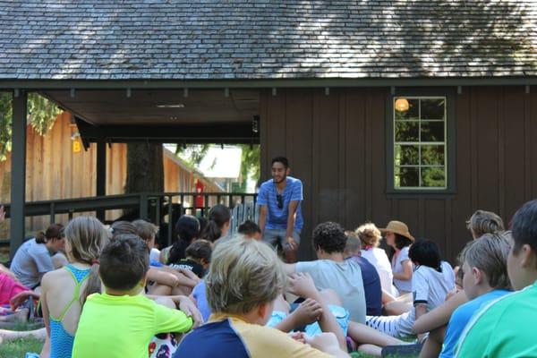 Overnight campers listening to Seattle Sounder player