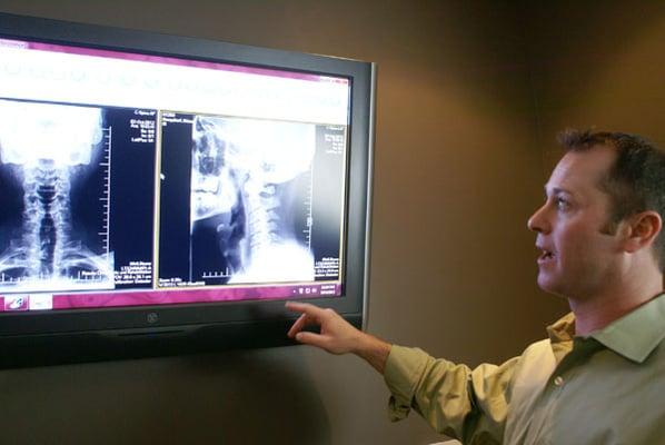 Examining x-rays with Dr. Price.