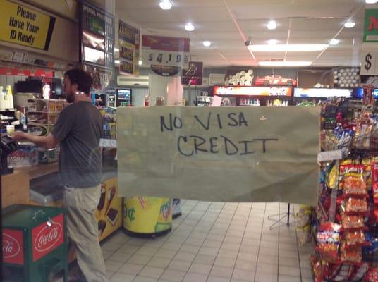 Sign at the pump?  NOPE. Gotta go to the door to find out.