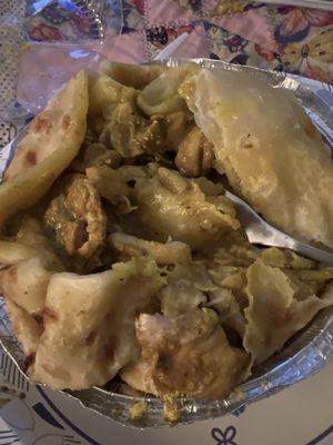 Curry chicken roti. Sorry fork flew in before I could take the picture. Had to get a taste.