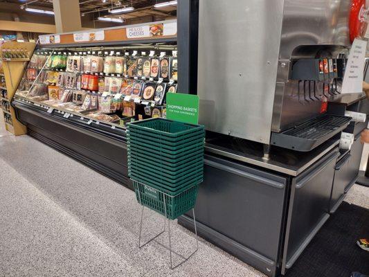 Baskets everywhere throughout the store, so you can always grab a basket to carry more.