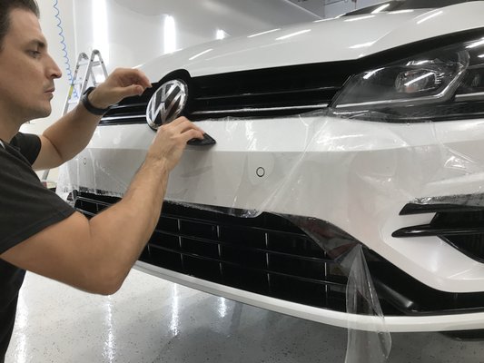 XPEL ultimate PPF application to front bumper of VW