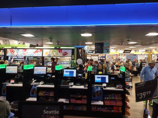 4 perfectly working self-check outs, all "closed" with a handwritten note and a line 30 minutes long to check out.