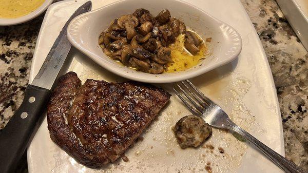 Ribeye steak with mushrooms