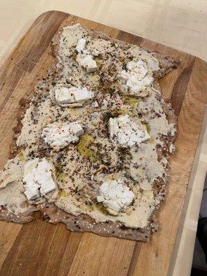 Sangak with hummus, feta, and Zaatar.  Delicious!