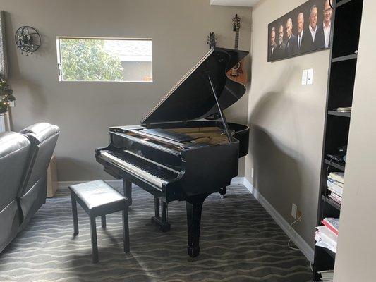 Grand piano was moved safe and sound.