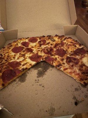 "Hand tossed" pepperoni with "extra sauce". Where's the sauce? Where's the hand-tossed crust? More like thin crust.