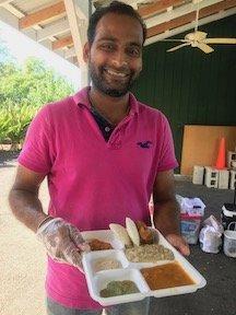 Owner Adesh serves Thursday plate lunch special