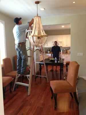 Joes hanging my chandelier!